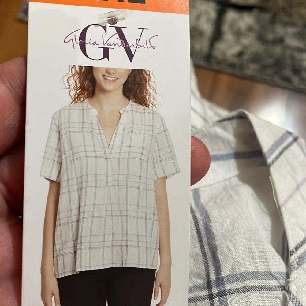 - Woman’s Gloria Vanderbilt tops